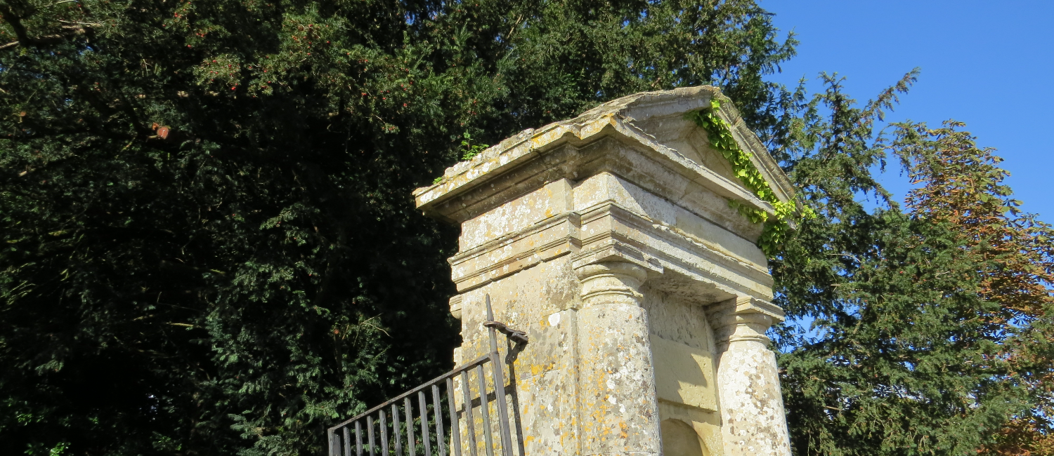 Stone feature with ivy growing on it